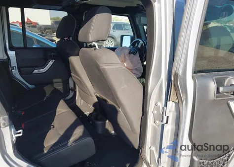 2015 Jeep Wrangler Unlimited Sahara z USA, uszkodzony, nr VIN 1C4BJWEGXFL603690